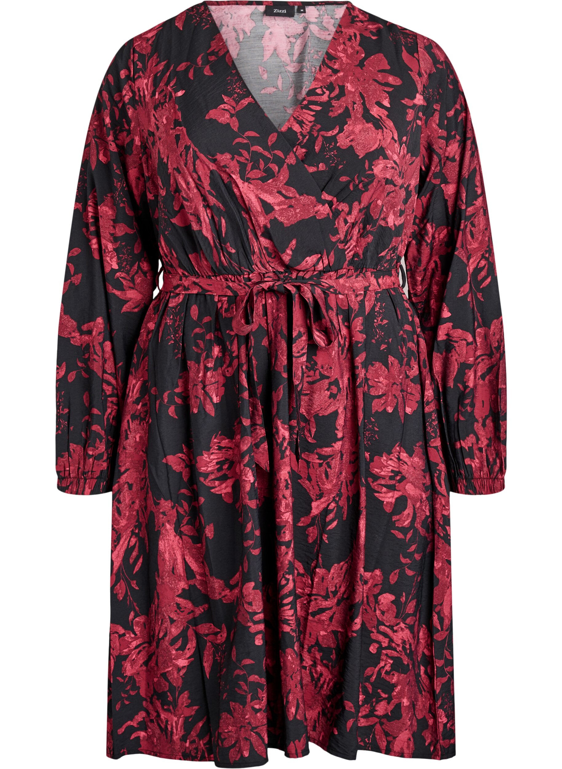 Knelang kjole med knytebelte og omslagsuttrykk