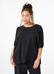 Kortermet bluse med sløyfe bak på ryggen, Black, Model image number 0
