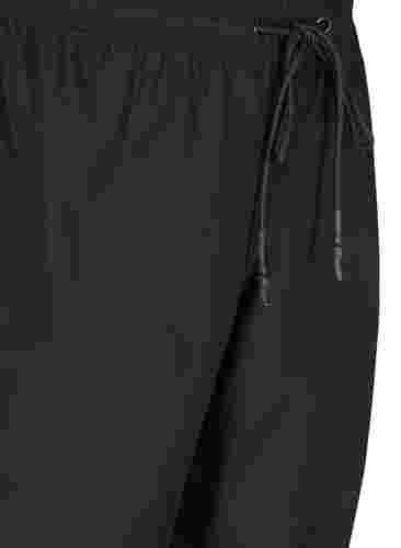 Regnbukser med strikk og knyting, Black, Packshot image number 2