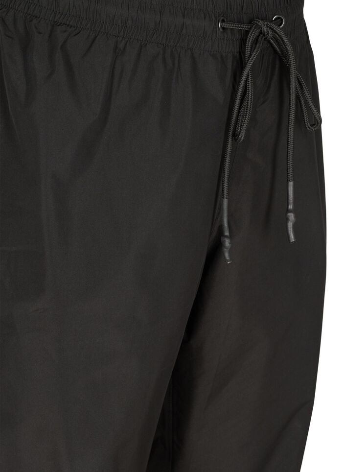 Regnbukser med strikk og knyting, Black, Packshot image number 2