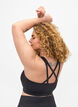 Sports-bh med kryssdetaljer i ryggen, Black, Model image number 1