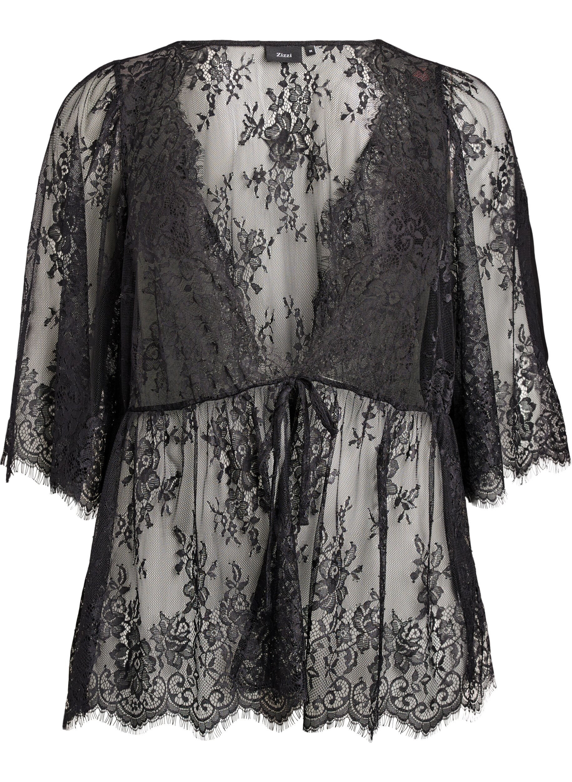 Blondetopp med knytedetalj og 3/4 ermer