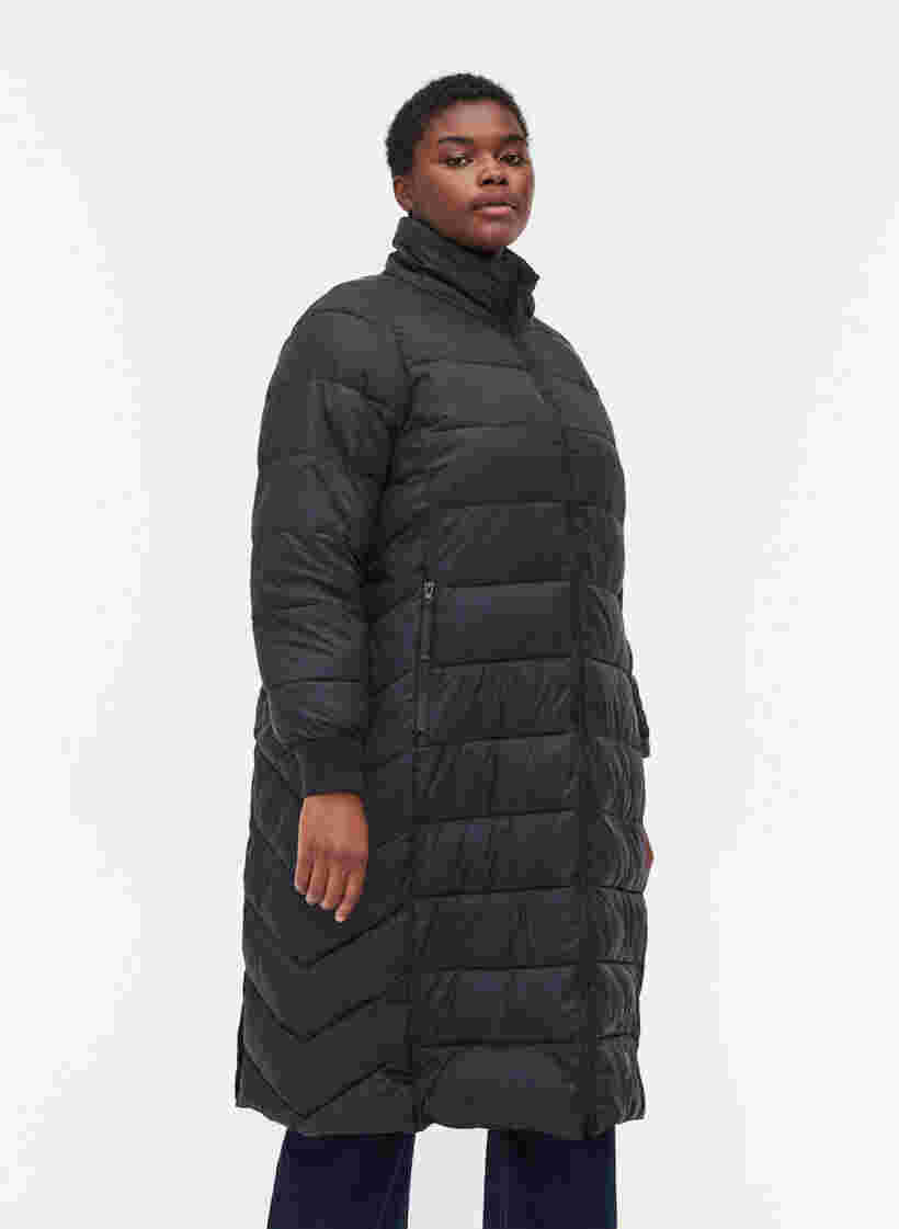 Lang quiltet vinterjakke med lommer, Black, Model