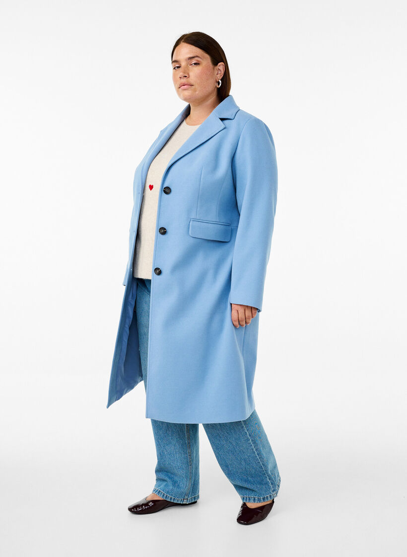 Lang kåpe med en splitt på ryggen, Della Robbia Blue, Model