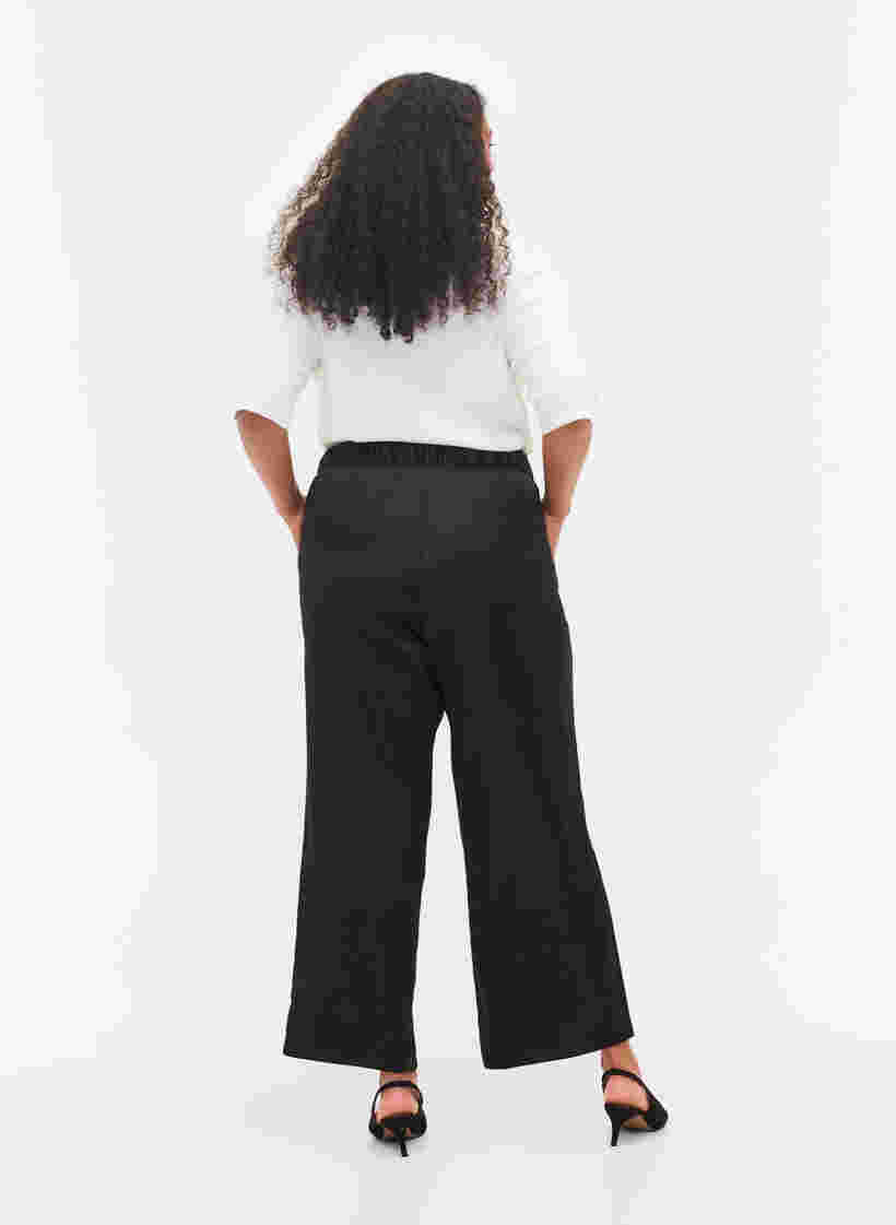 Løse bukser med lommer og strikkant, Black, Model image number 1