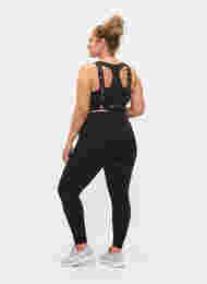 Cropped treningstights med baklomme, Black, Model