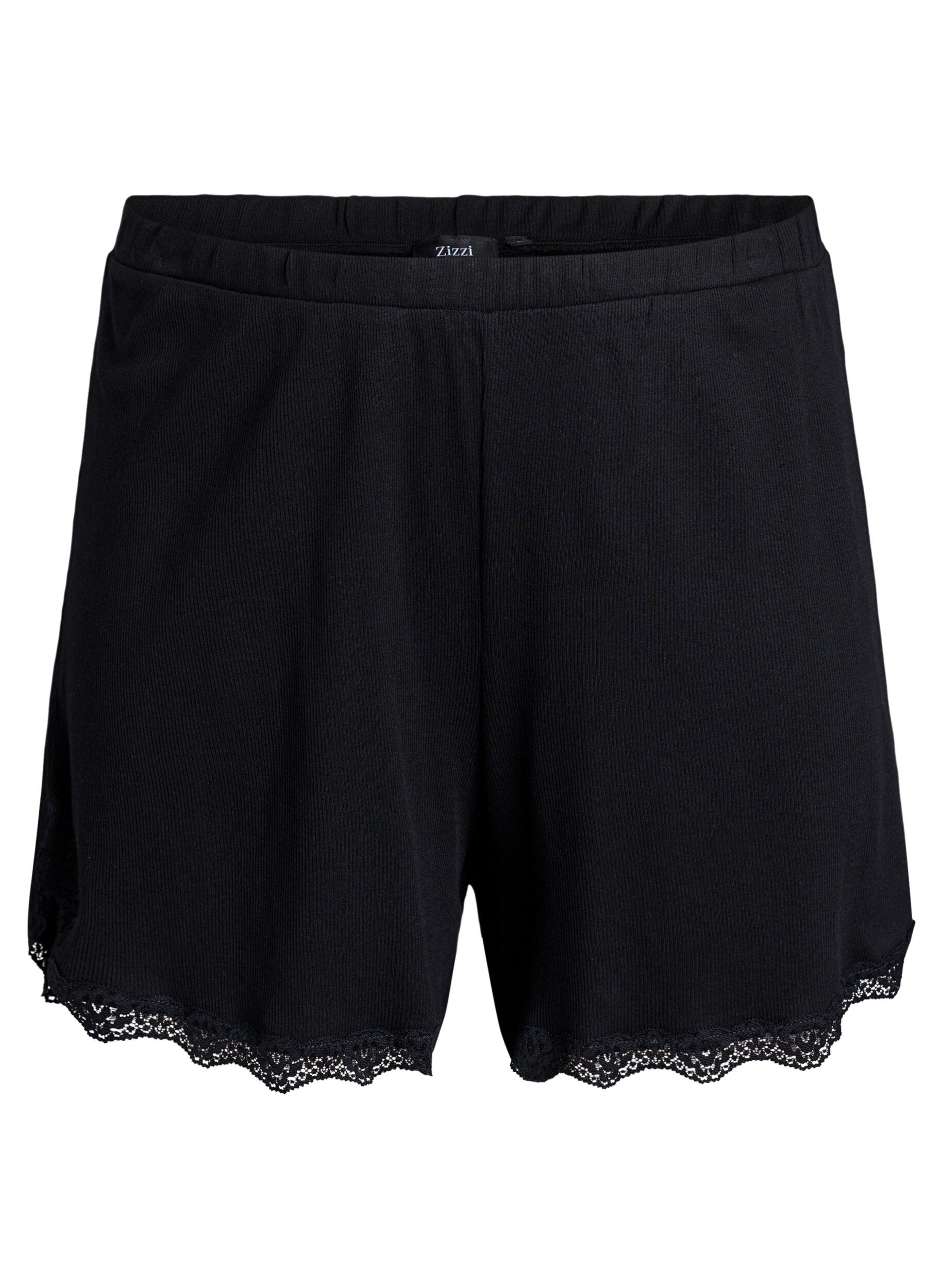 L&oslash;se nattshorts med ribbestruktur og blonderkant