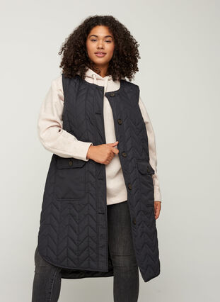 Lang quiltet vest med lommer, Black, Model image number 0