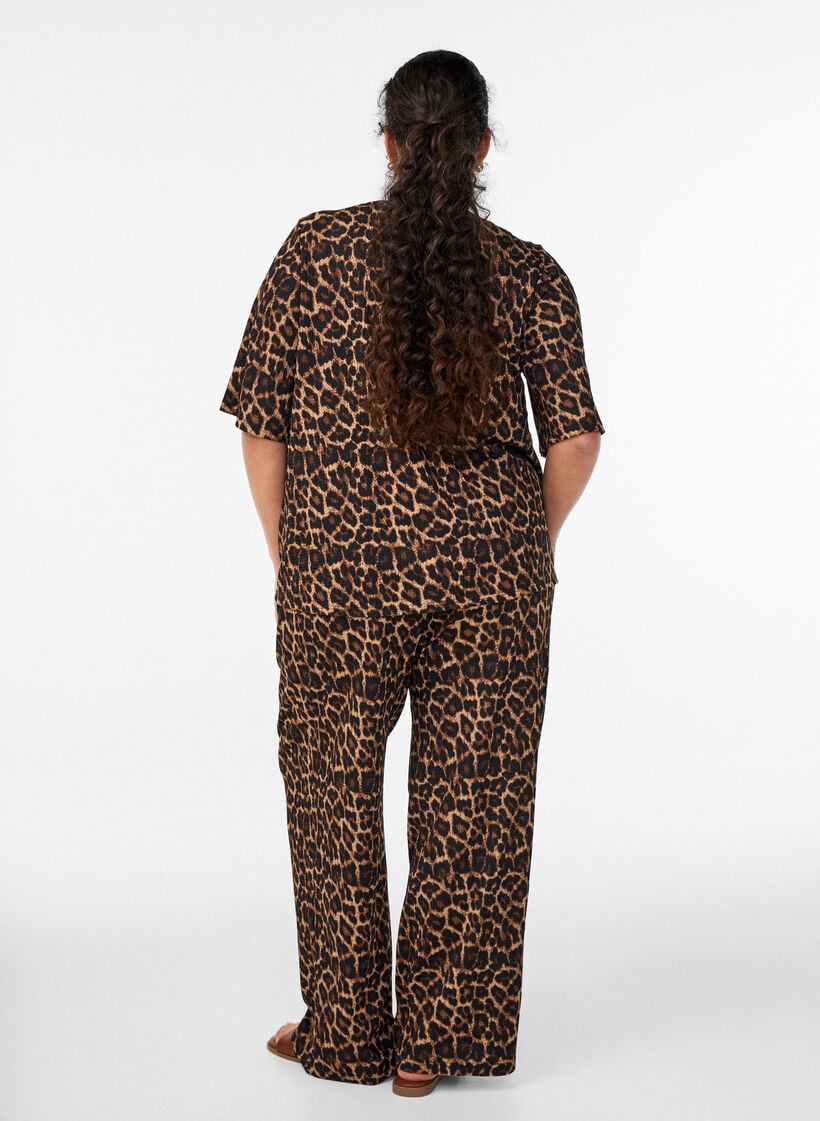 Bukser med vide ben i et lett teksturert stoff, Svart, Model image number 1