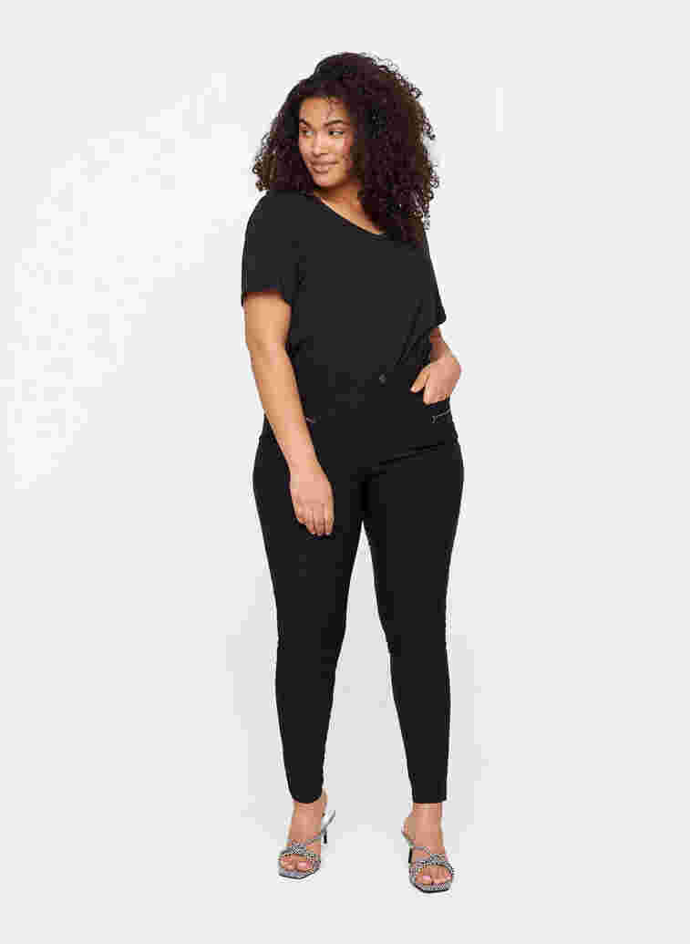 Tettsittende bukser med glidelåsdetaljer, Black, Model image number 0