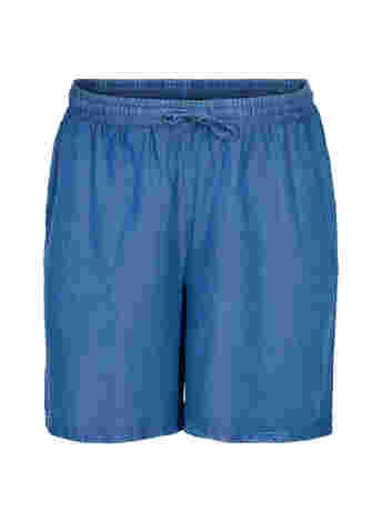 Løse shorts med knyting og lommer
