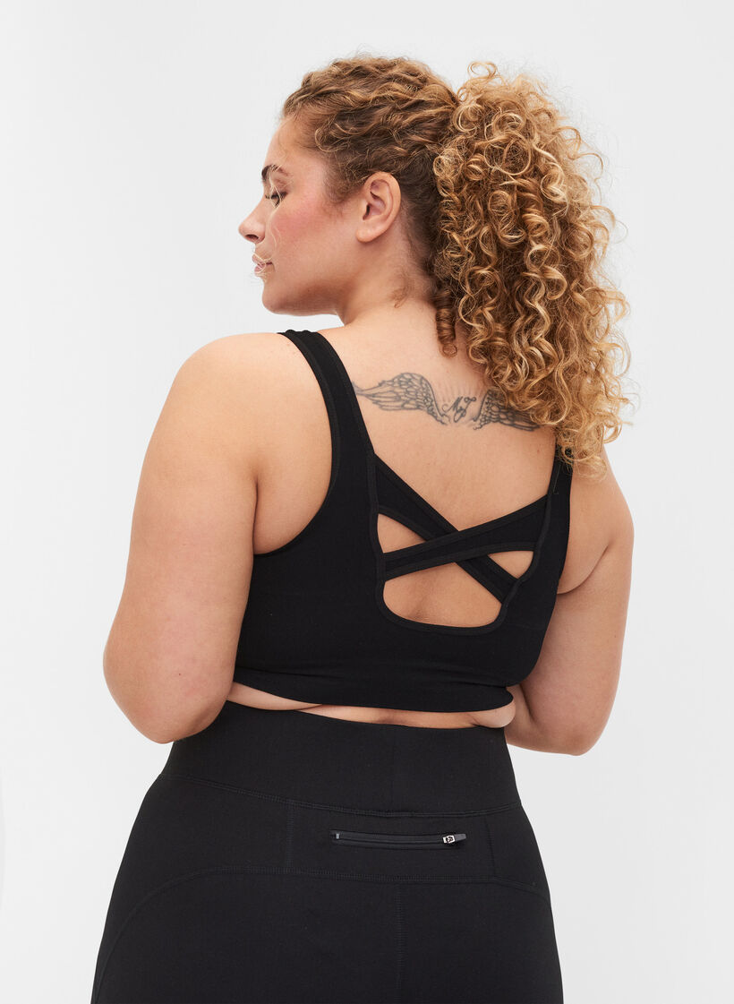 Ensfarget sports-BH med en krysset rygg, Black, Model image number 1