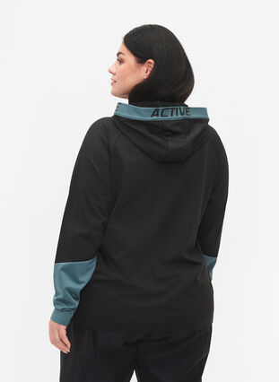 Treningscardigan med hette, Black, Model image number 1