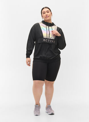 Tettsittende treningsshorts, Black w. Deep Taupe, Model image number 4