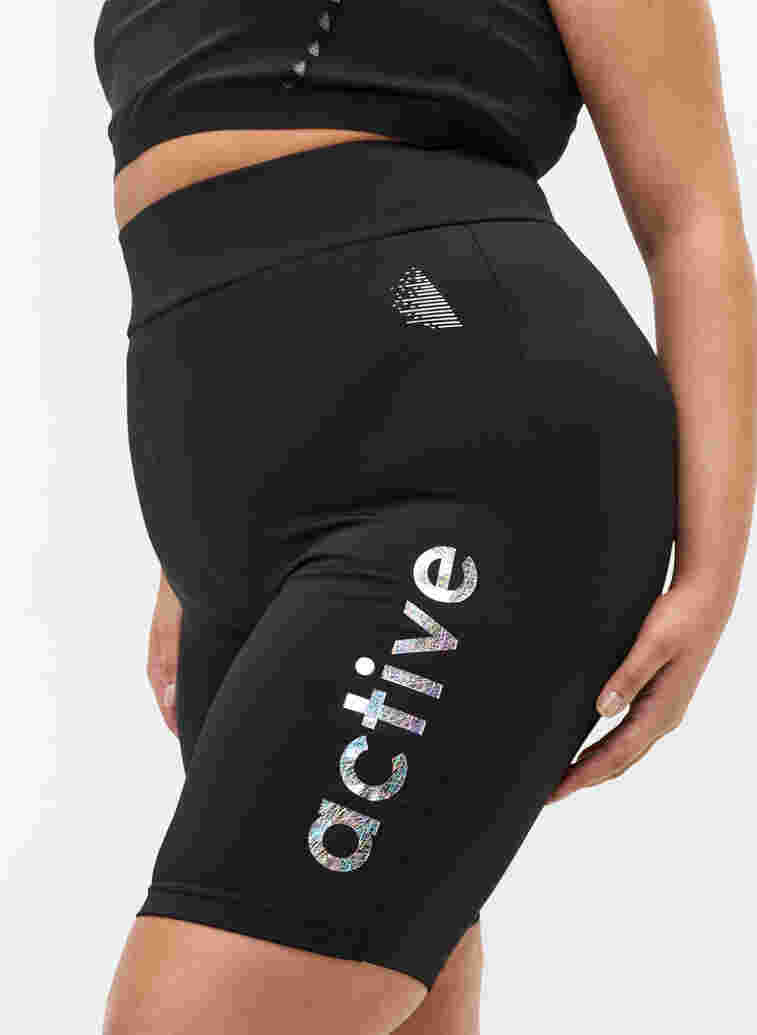 Tettsittende treningsshorts med trykk, Black, Model