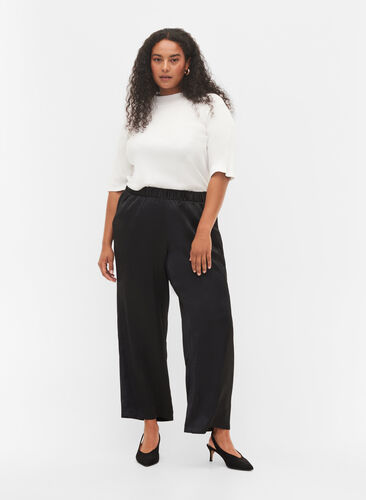 Løse bukser med lommer og strikkant, Black, Model image number 0