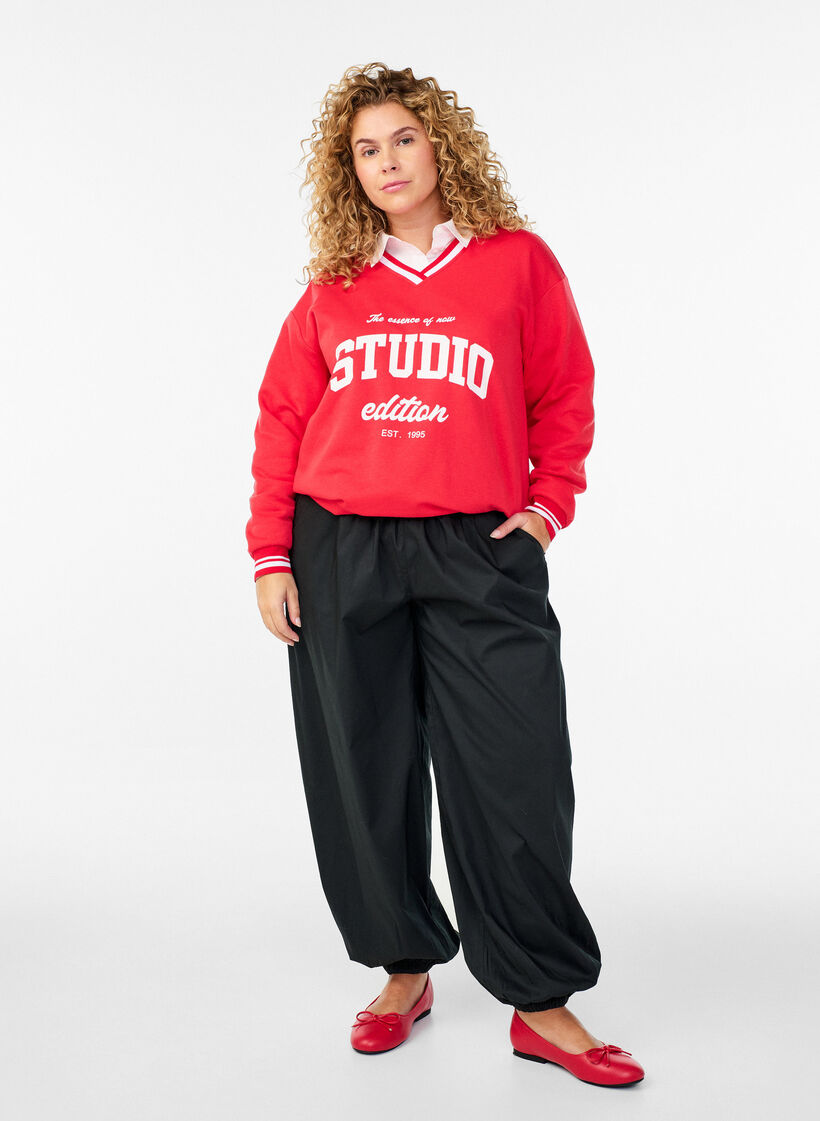 Ballongbukser med lommer og elastisk midje, Svart, Model