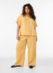 Bluse i bomullsmusselin med korte ermer, Gul, Model image number 1