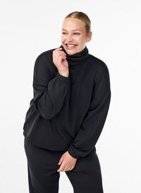 Bluse i modalblandet kvalitet med halvpolo, Svart Bluse i modalblandet kvalitet med halvpolo, Svart, Model