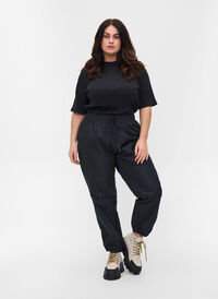 Regnbukser med strikk og knyting, Black, Model