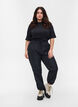 Regnbukser med strikk og knyting, Black, Model image number 0