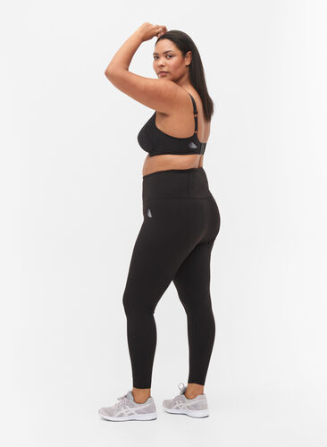 CORE, SUPER TENSION TIGHTS - Treningstights med innvendig lomme, Black, Model image number 1