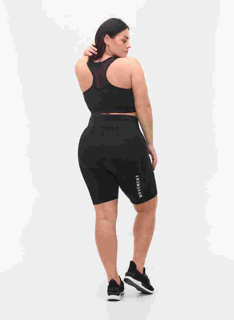 Tettsittende treningsshorts med tekst, Black, Model