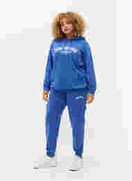 Joggebukser med cargolommer, Dazzling Blue, Model