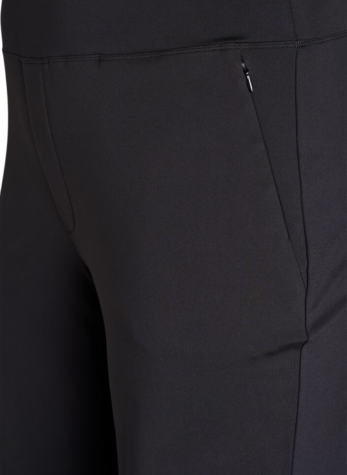 Trendy treningsbukser med en lett utsving, Black, Packshot