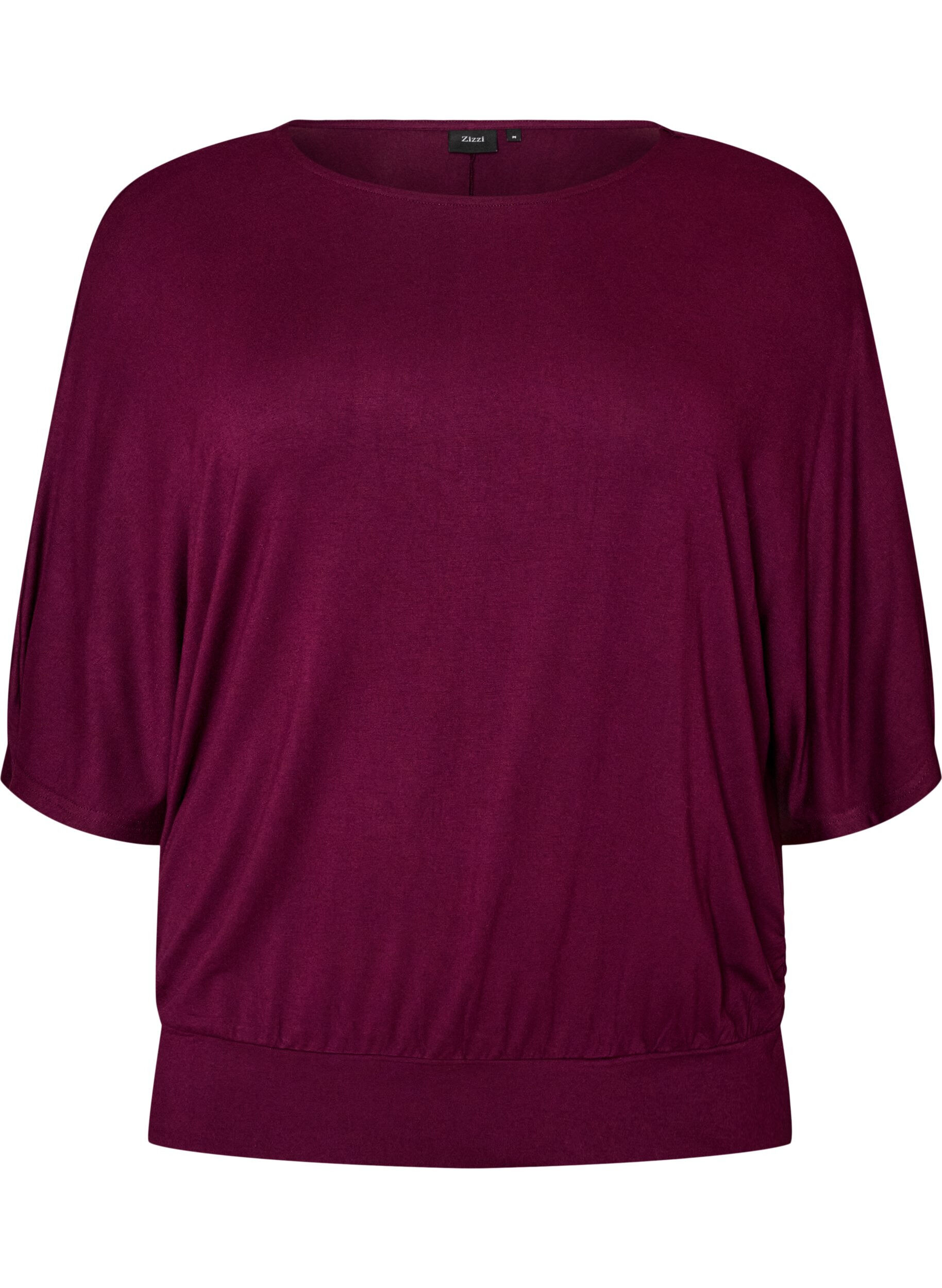 Jerseybluse med albuelange ballongermer