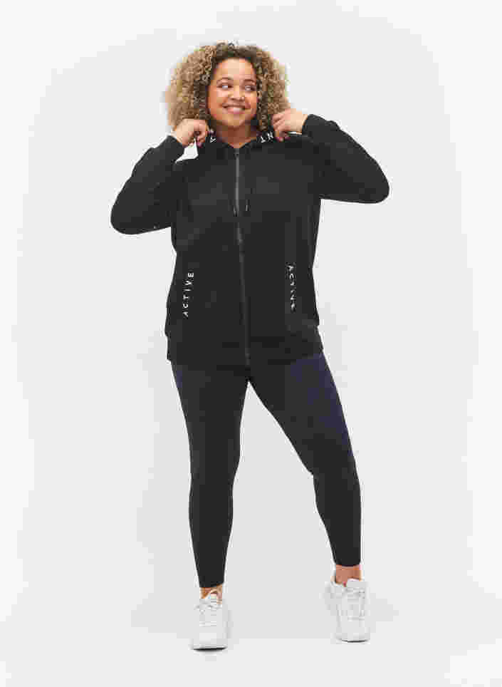 Treningsjakke med glidelås og hette, Black, Model image number 2