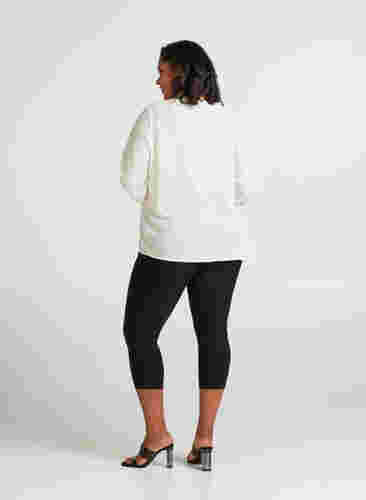 Tettsittende 3/4-bukser med glidelås, Black, Model image number 1