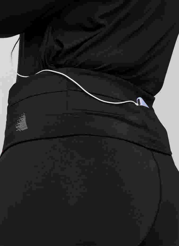 Løpebelte med lommer og glidelås, Black, Model image number 0