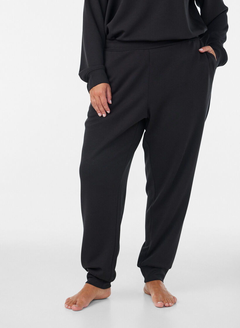 Jerseybukser med h&oslash;y midje og lommer, Svart, Model image number 2