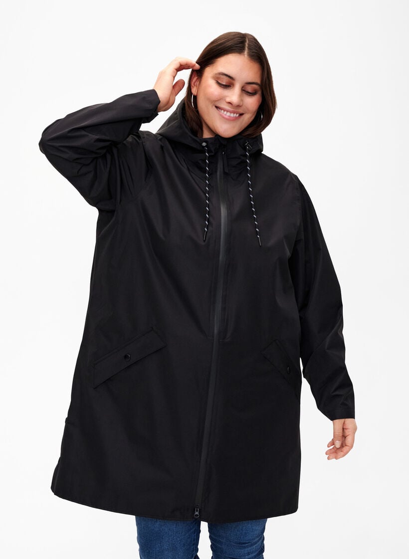Regnjakke med lommer og hette, Svart, Model image number 0
