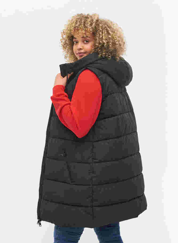 Lang vest med hette og lommer, Black, Model