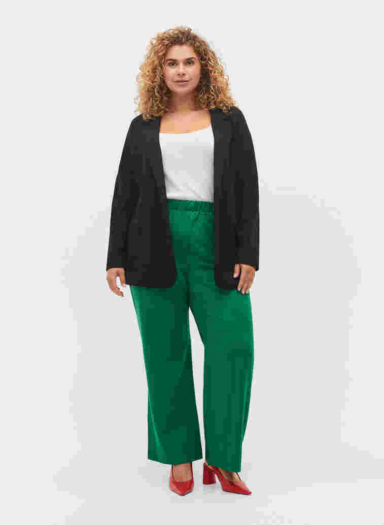 Slengbukser med lommer, Verdant Green, Model