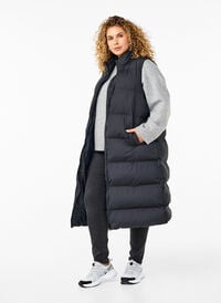 Lang vest med lommer og toveis glidelås, Svart Lang vest med lommer og toveis glidelås, Svart, Model
