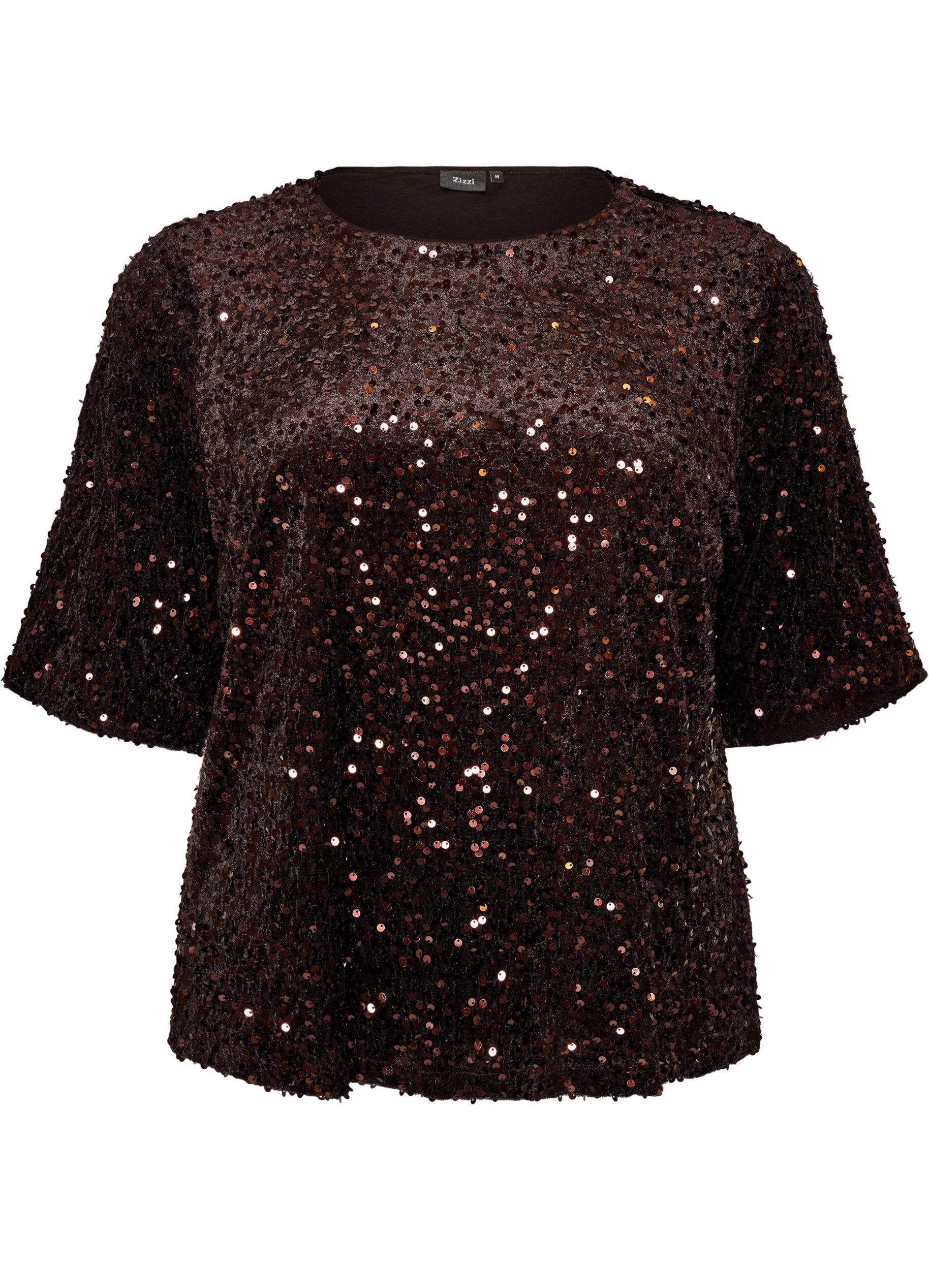 Paljettbluse med albuelange ermer