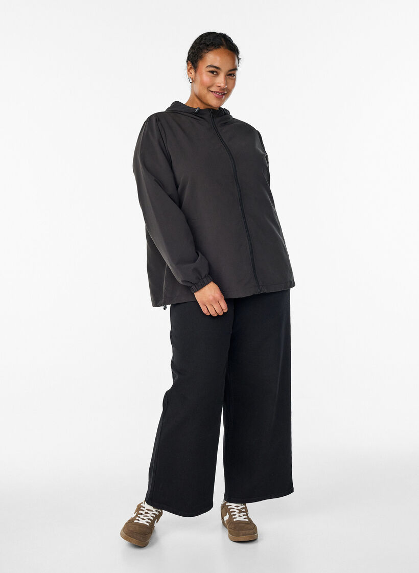 Lett jakke med hette og glidel&aring;s, Svart, Model image number 1