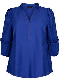 Bluse med ruffles, Surf the web