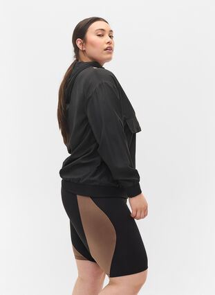 Tettsittende treningsshorts, Black w. Deep Taupe, Model image number 2