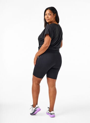 Ettersittende shorts med høy midje og lommer, Black, Model image number 1