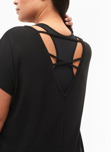 Kortermet treningsbluse med dyp skjæring i ryggen, Black, Model image number 1