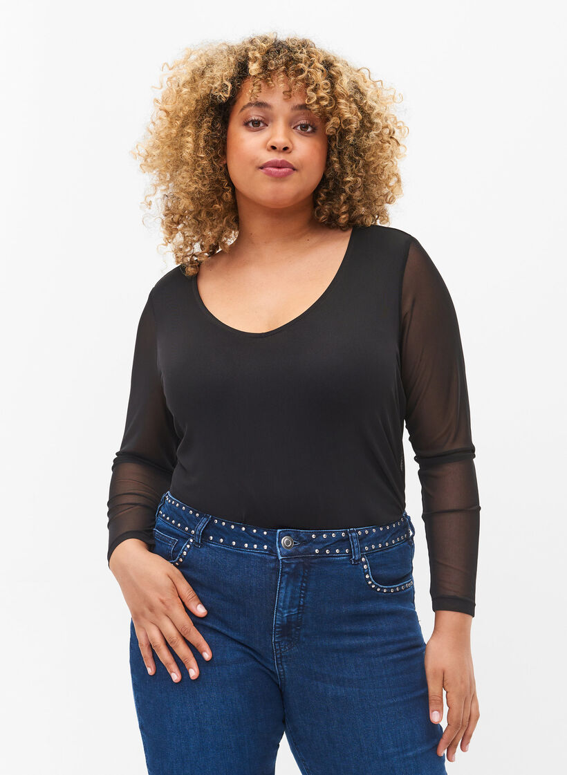 Tettsittende bluse i mesh med V-hals, Black, Model image number 0