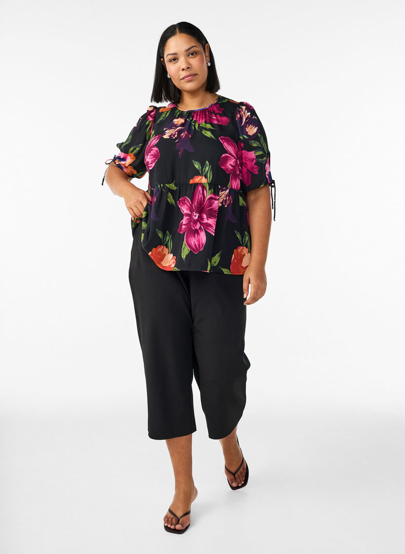 Bluse med blomstertrykk og peplum, Svart, Model image number 1
