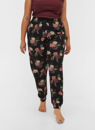 Mønstrete pysjamasbukser i økologisk bomull, Black AOP Flower, Model image number 2