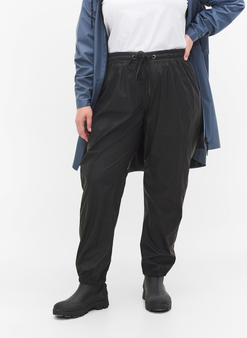 Regnsbukser med strikk og knyting, Black, Model image number 2