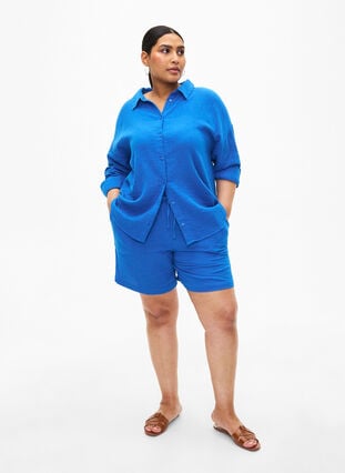 Shorts i bomullsmusselin med lommer, Victoria blue, Model image number 3