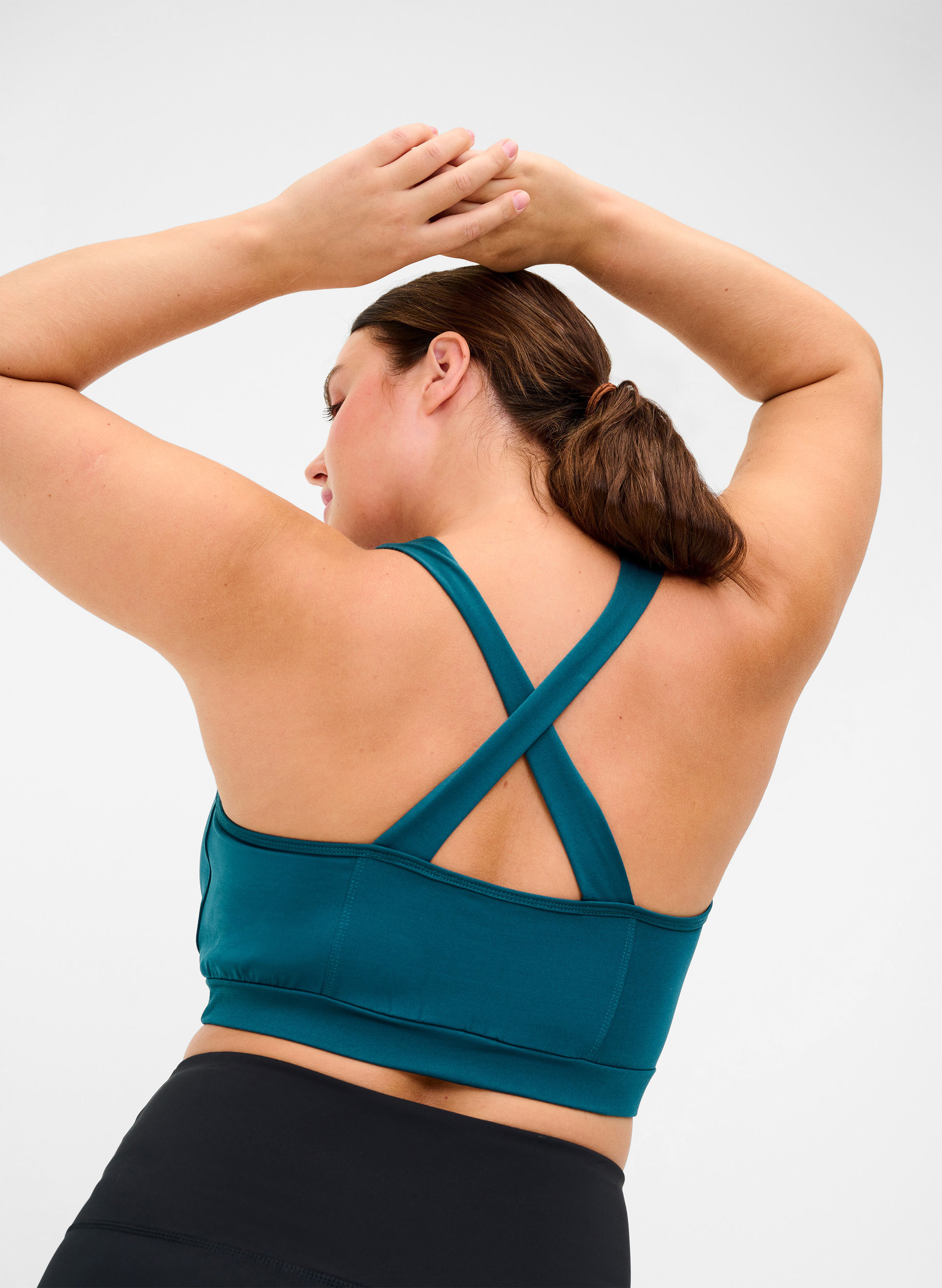 Ensfarget sports-BH med krysset rygg, Deep Teal, Model image number 1